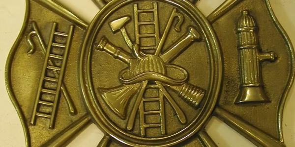 gold-fireman-firefighters-museum-maryland-badge